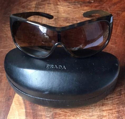 prada sunglasses made in italy|popular Prada sunglasses.